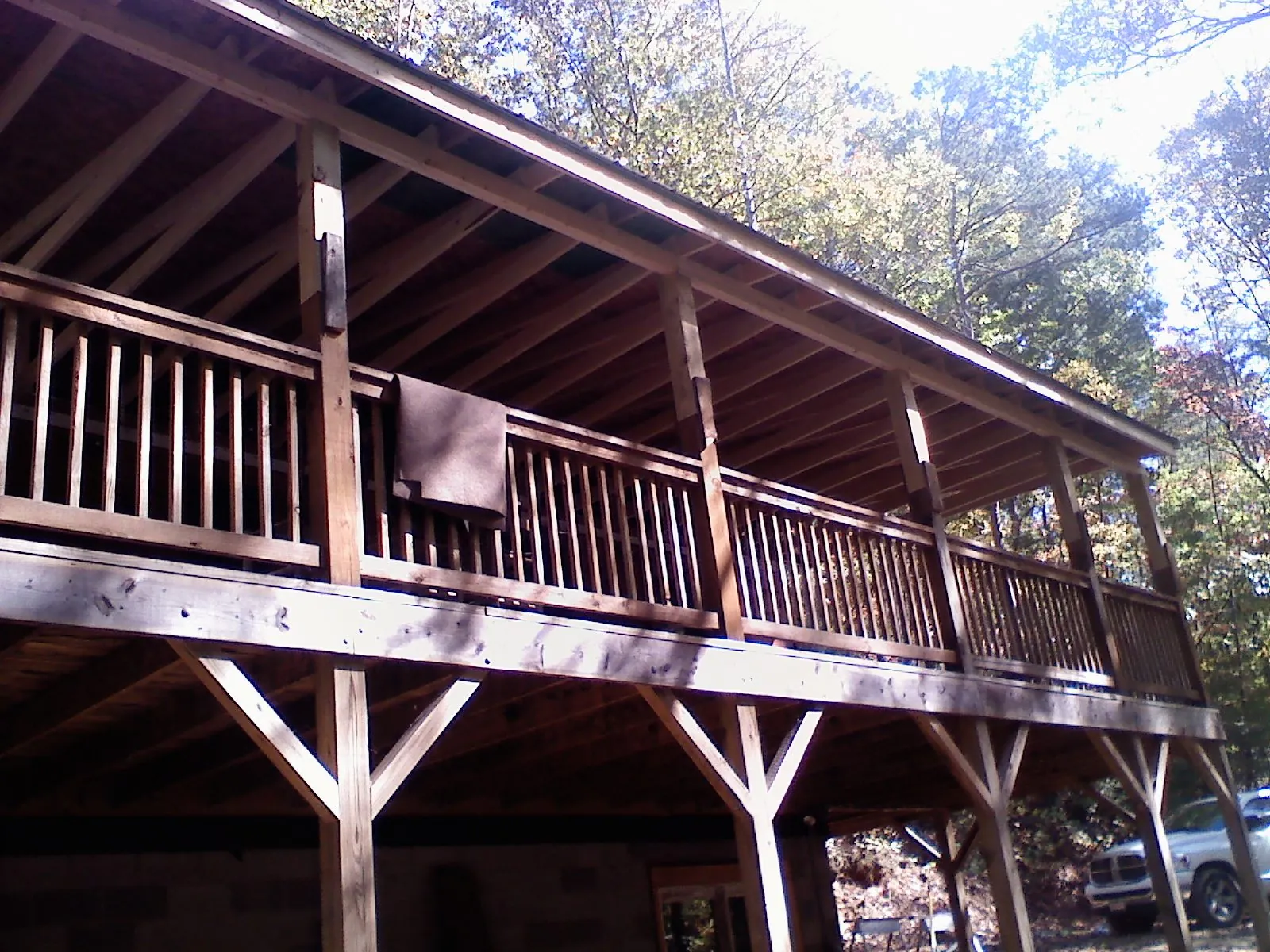 Timber framing under a new elevated porch and deck — Roof Leak Repair in Corrigan by Roofing Brothers